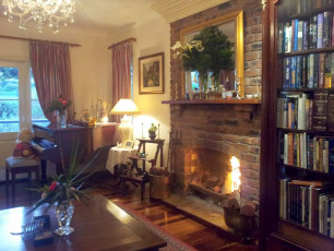 Amore BandB roaring fire in guest lounge