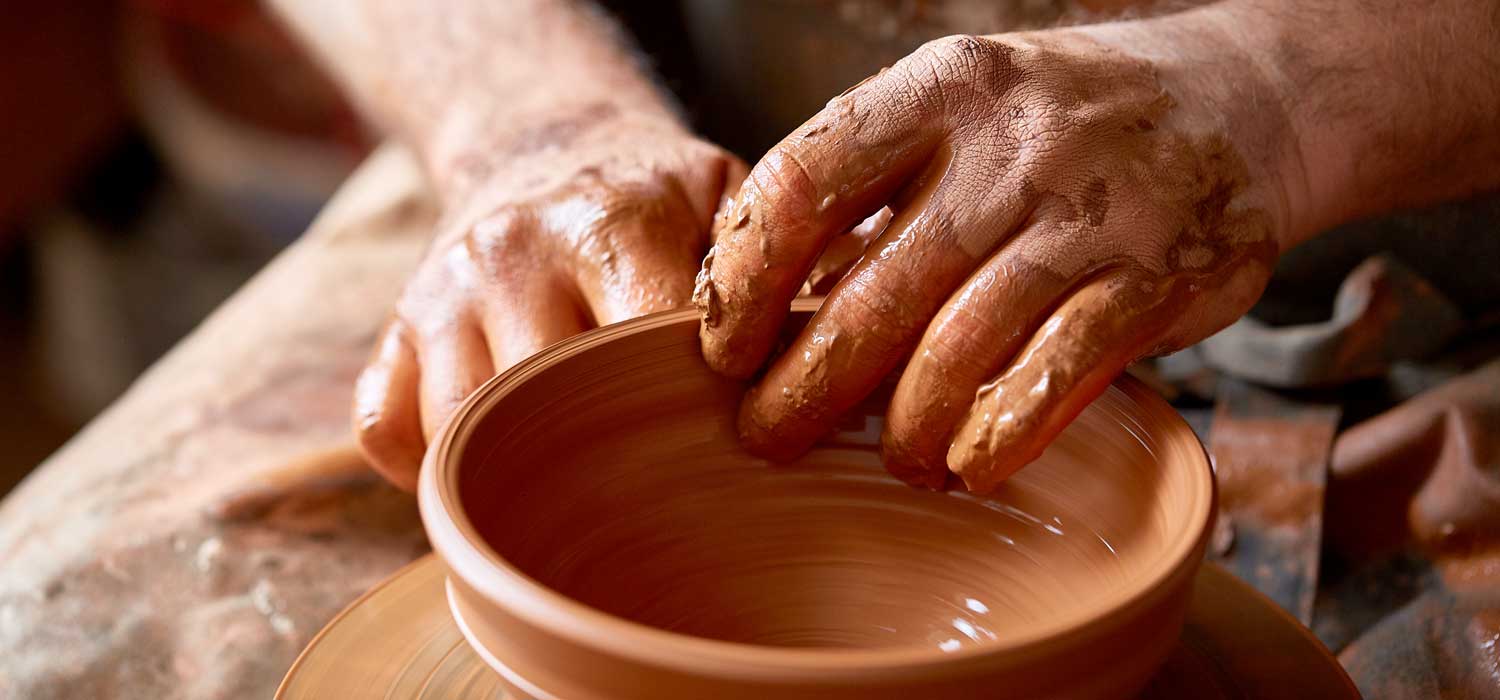 Pottery and Textiles Workshop - Potter working