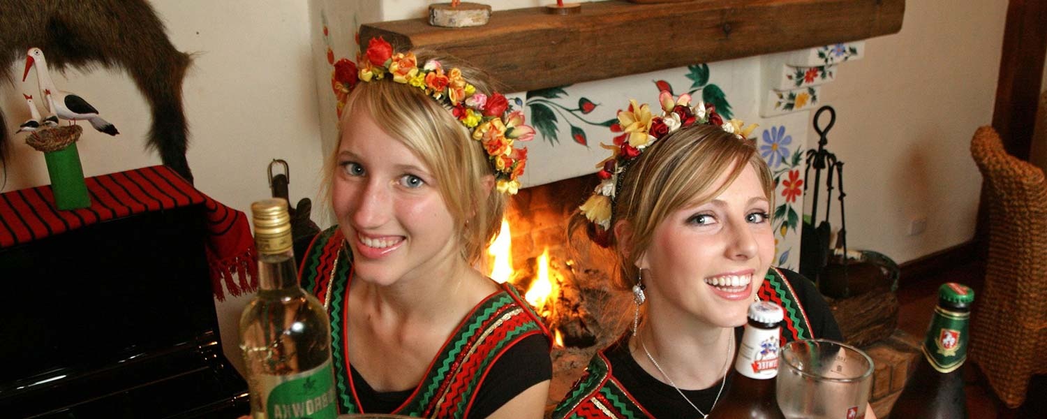 two waitresses in traditional Polish costumes